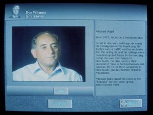 A display monitor showing an oral history interview.
